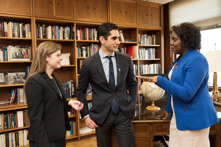 Johns Hopkins SAIS students talking to one another 