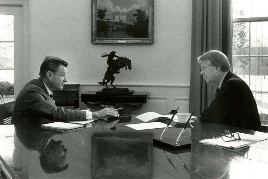 President Carter talking with colleague