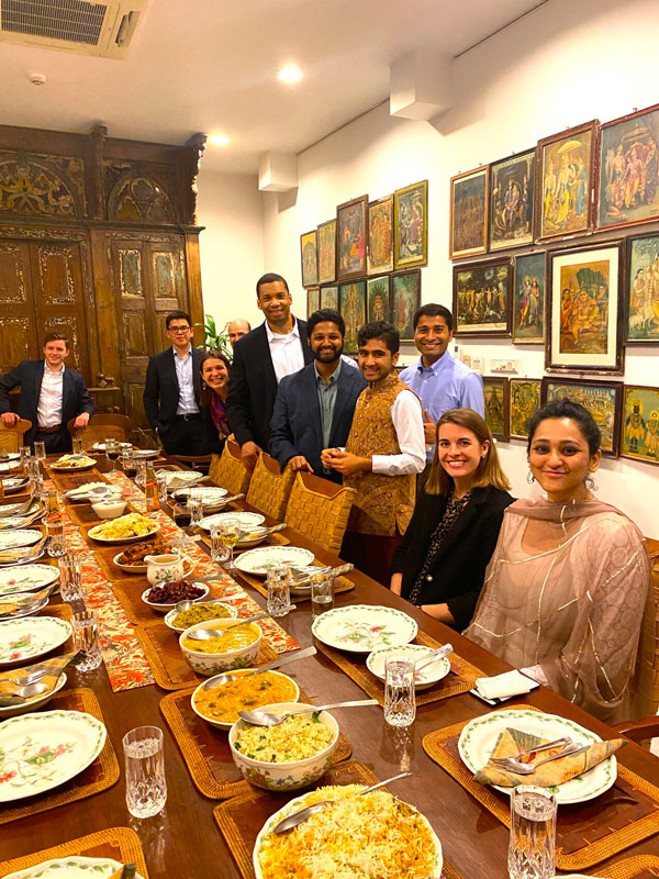 Student group photo during dinner, in India