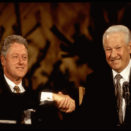 President Bill Clinton and President Boris Yeltsin shaking hands