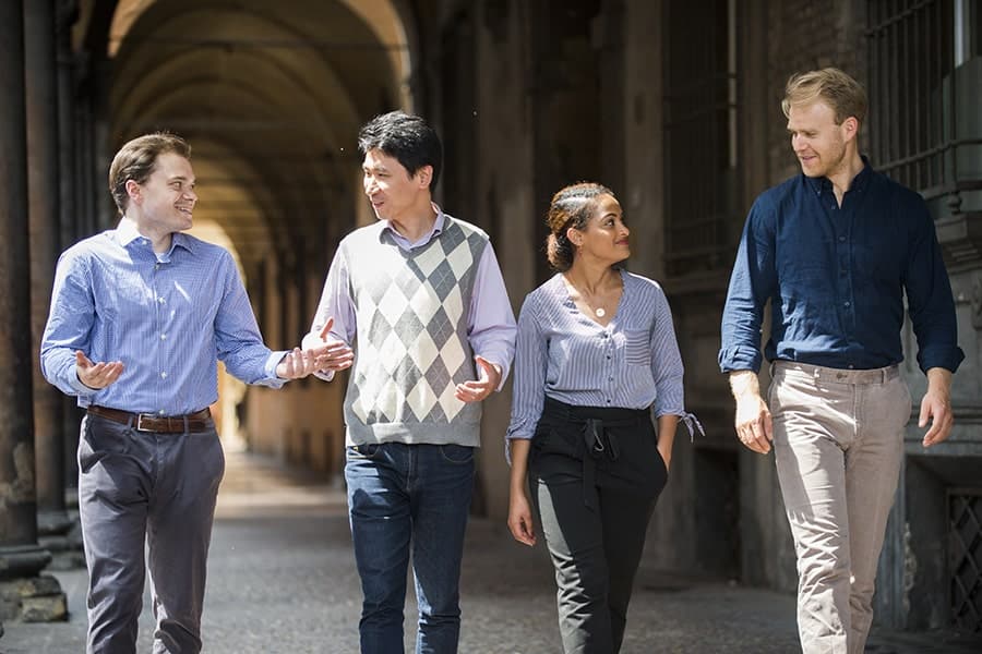 Students walking in porticoes