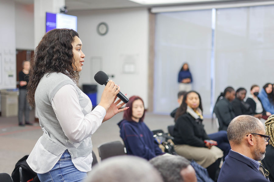 Kayla Smith poses a question to Travis Adkins