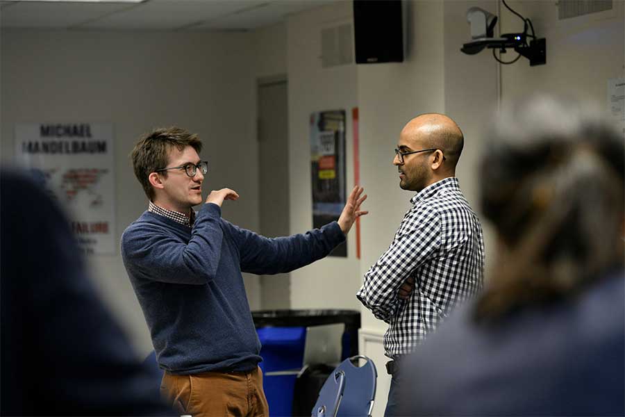 Two students talking to each other