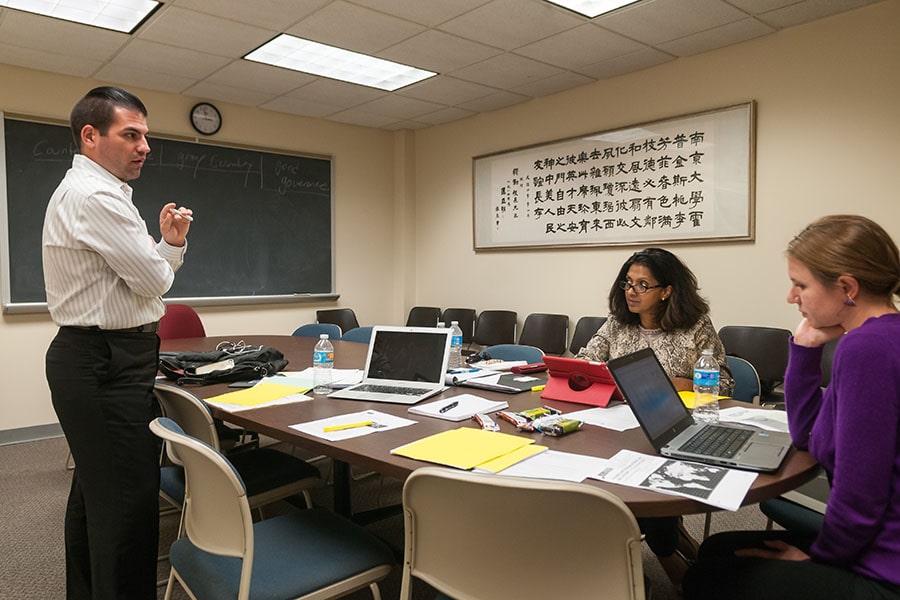 Johns Hopkins SAIS students working on a group project 