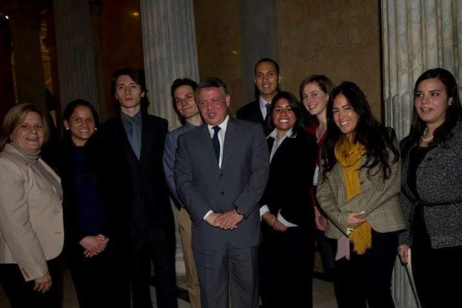 students and faculty setting at a roundtable event