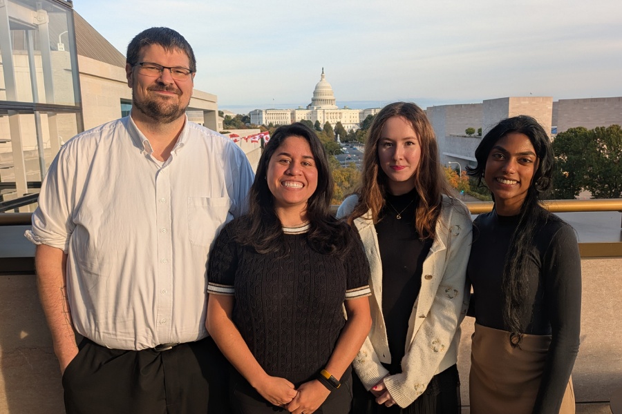students and faculty setting at a roundtable event