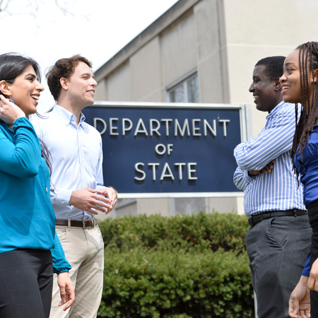 Johns Hopkins SAIS students in front of the US Department of State