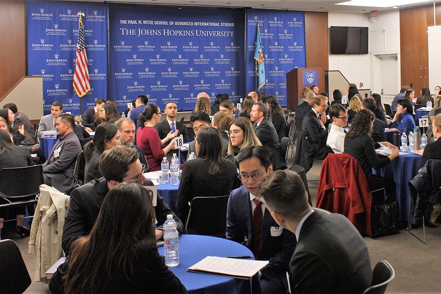 Students sit down with alumni to craft their elevator pitches.