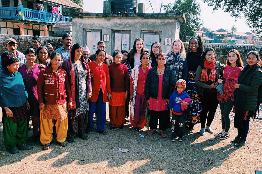 The SAIS Women Lead Nepal Practicum Team take a photo with men and women from the Udayapur Mobile Workshop.