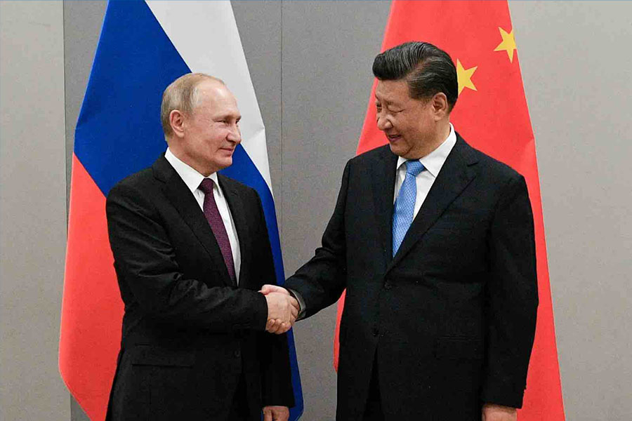 Russian President Putin meets with Chinese President Xi in Brasilia, March 2022, Sputnik Photo Agency via Reuters, Accessed from Foreign Affairs