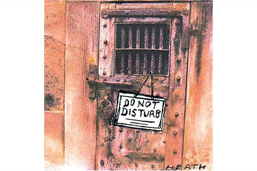 Heath, a cell door with a sign that reads, "Do Not Disturb."
