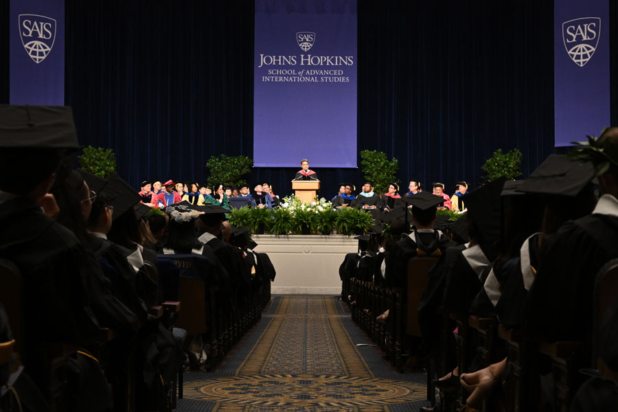 Speaker standing on stage 