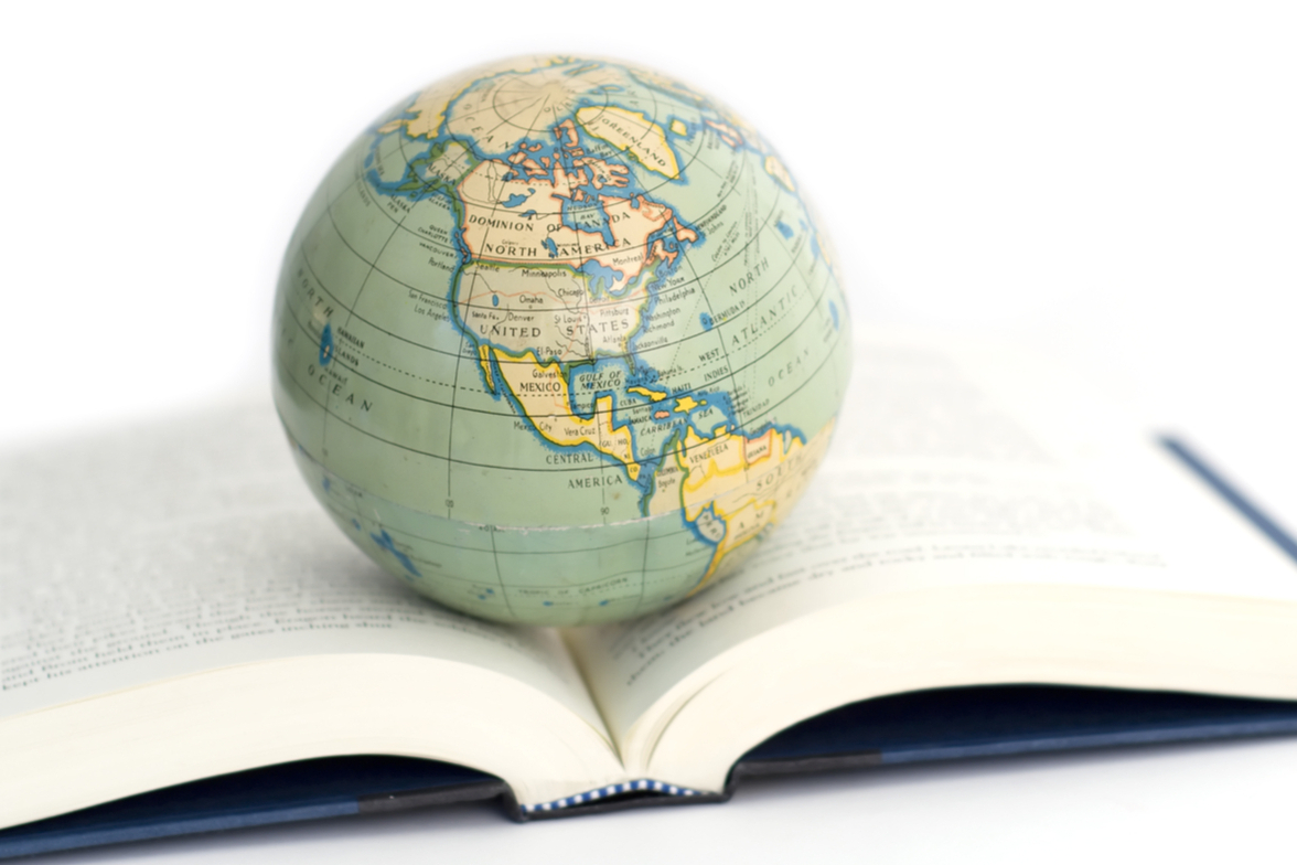 image of a globe on an open book