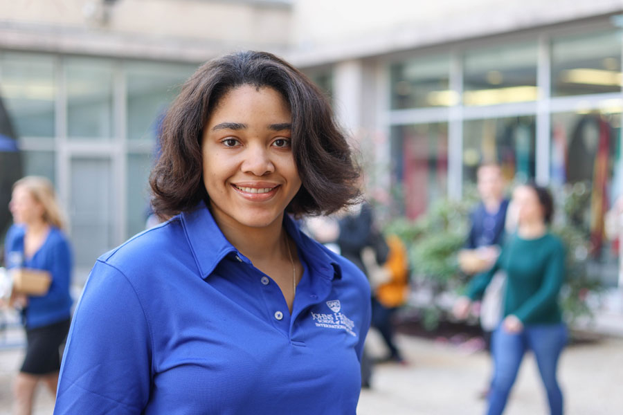 Photo of Kayla Smith outside in the Nitze courtyard 