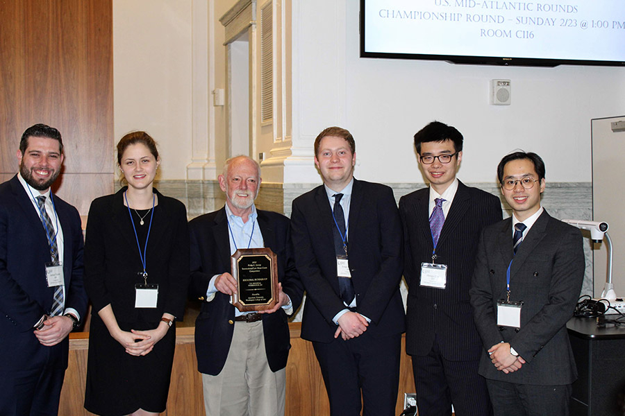Students win an award for their participation in a international law moot court competition.