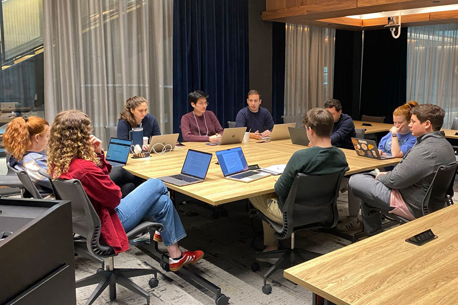 Students sitting at a table in class 