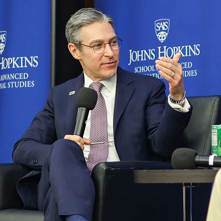 Wilson speaking at an Event at SAIS 